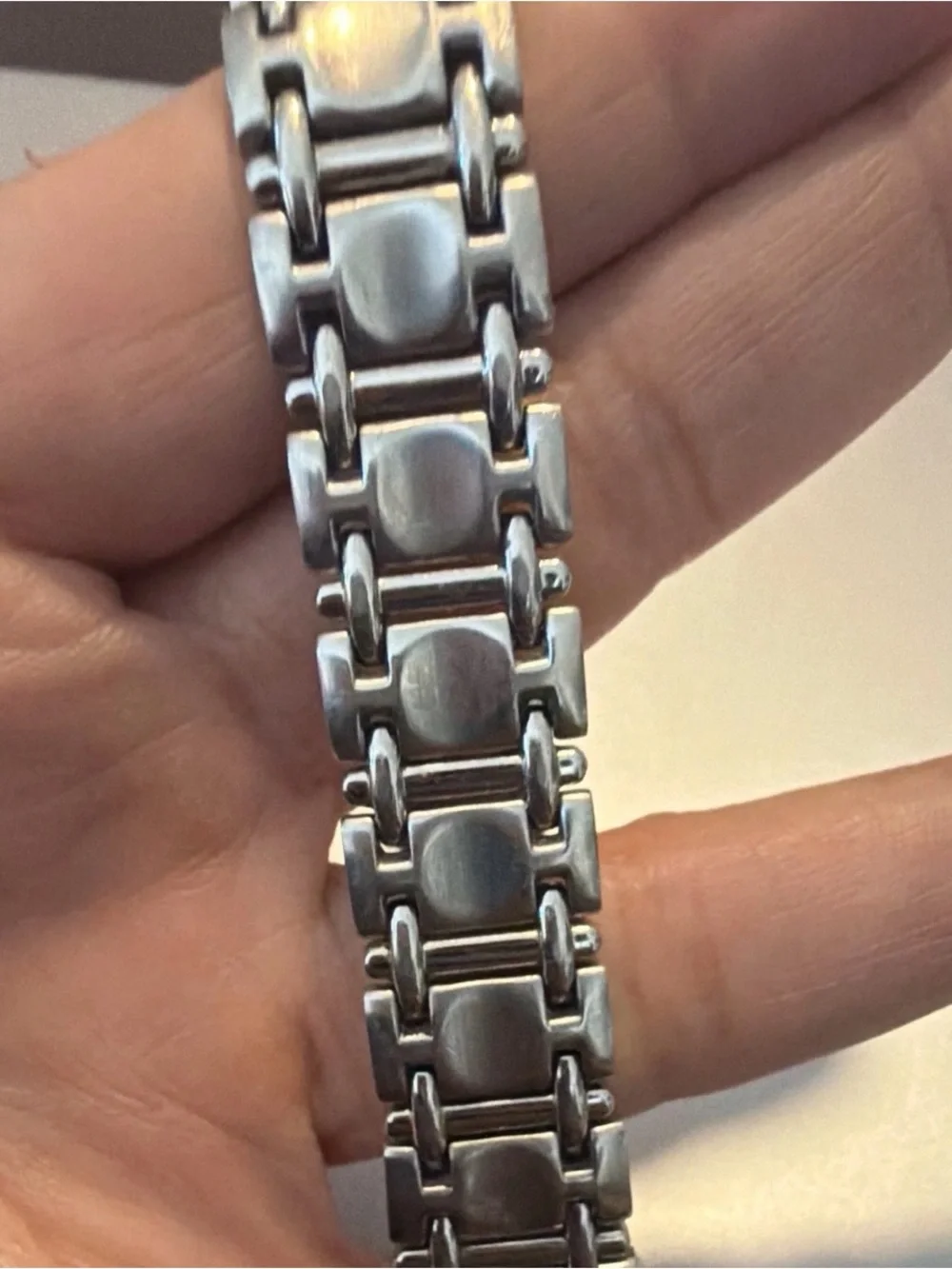 Movado Silver Bracelet Watch with Black Dial